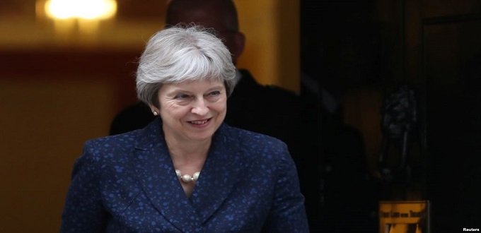 Désaccords sur le Brexit: Theresa May perd deux poids lourds de son gouvernement
